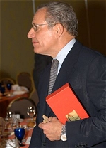 Bob Woodward holds a crystal award